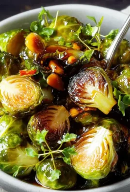 Honey Balsamic Brussels Sprouts roasted until crispy then glazed to perfection—a quick sprouts recipe! Make it and share your plate!